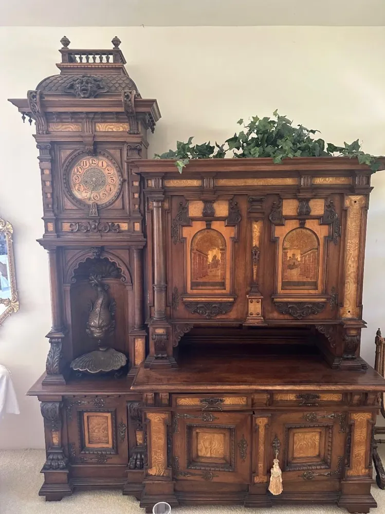 Antique carved clock cabinet from a past sale